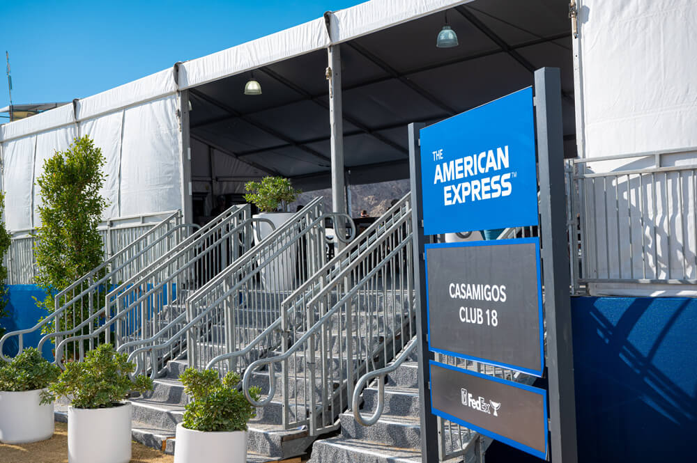 entrance to casamigos tent with stairs and sign